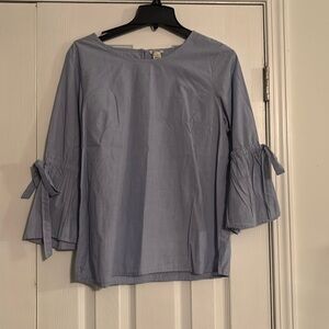 J Crew long sleeve light blue blouse with tie sleeves; size medium